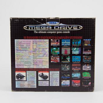 A "Sega Mega Drive" and nine games, 1990.s.