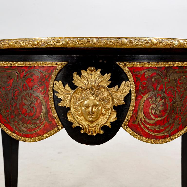 A Boulle style table around 1900.