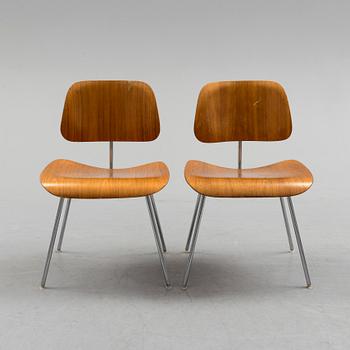 CHARLES & RAY EAMES, a pair of DCM chairs from Herman  Miller.