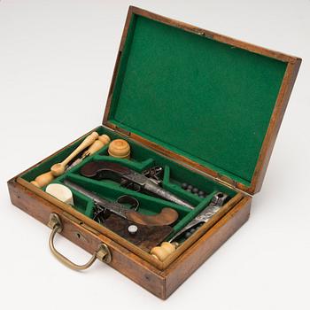 A pair of english boxlock flintock pistols marked E. Bond London, circa 1800.