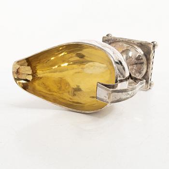 A Swedish Gustavian parcel-gilt silver sauce jug, mark of Daniel Hallman, Stockholm 1810.