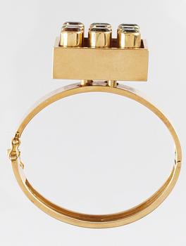 A Sigurd Persson 18k gold bangle with turmalines and citrines, Stockholm 1961.