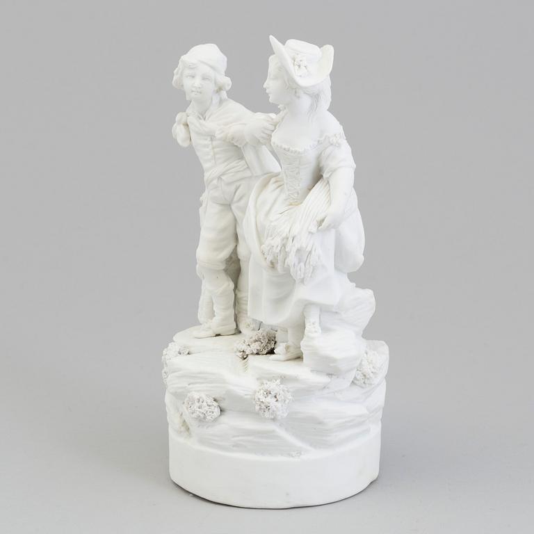 A French bisquit figure of a young couple, Paris, presumably late 18th Century.