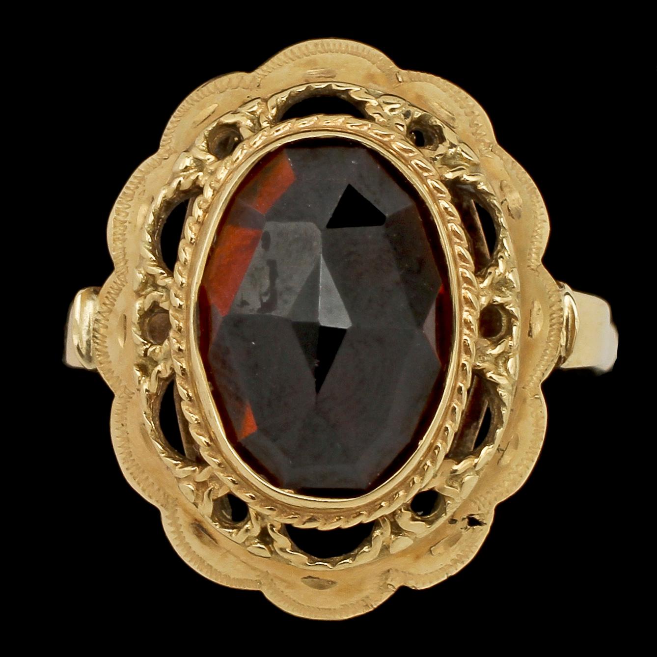 RING samt HÄNGE med KEDJA, 14k guld med fasettslipade rödbruna stenar. Tot vikt 17 g.