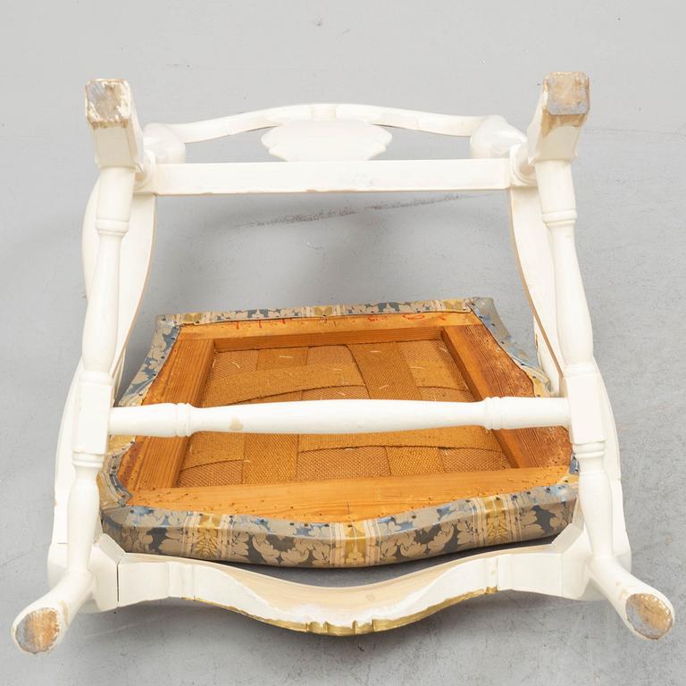 A dining table and six chairs, rococo style, mid 20th century.