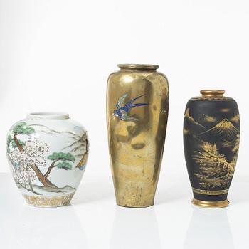 Two Japanese vases and a jar, porcelain and gilt copper, 20th century.