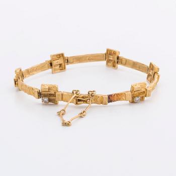 LAPPONIA ARMBAND 18K guld m 6 diamanter 8/8 0,12 ct totalt enligt gravyr, Finland 1976.