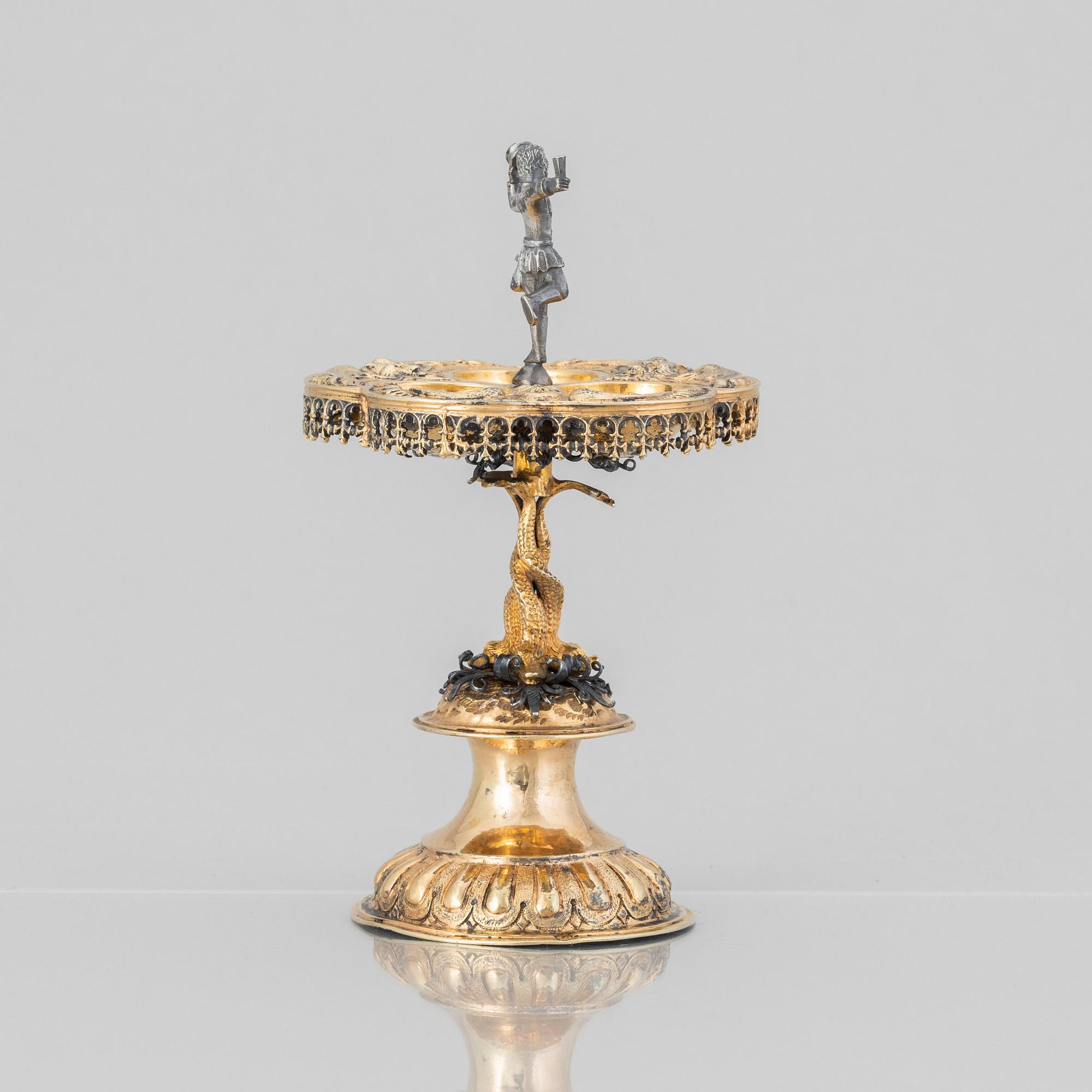 A German parcel-gilt saltcellar/spice rack, makers mark Paulus Braunacker, Nurnberg, probably mid 17th Century.
