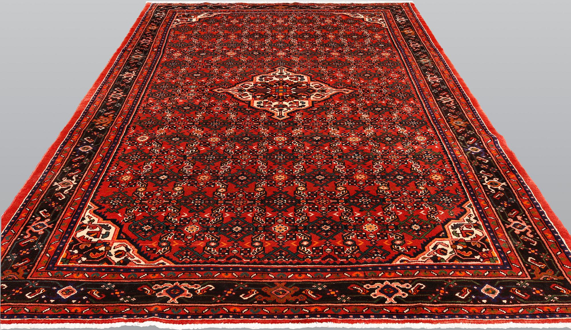 A Hosseinabad carpet,, ca 310 x 210 cm.