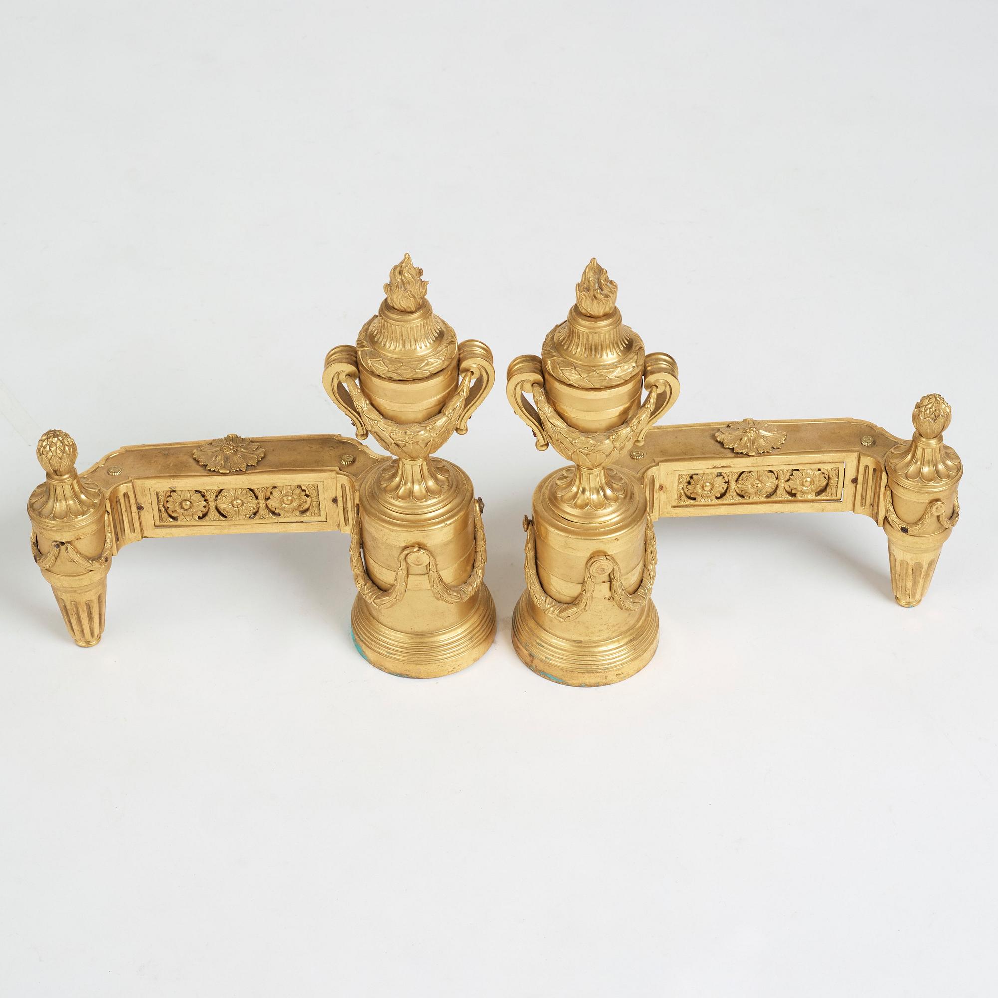 A pair of Louis XVI 18th Century bronze chenets.