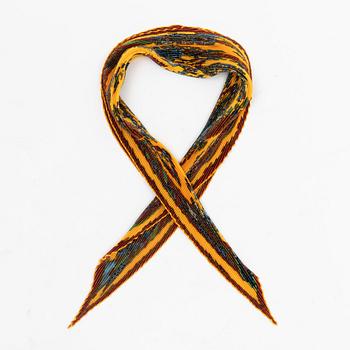 Hermès, a 'Astres et Soleils' silk scarf.