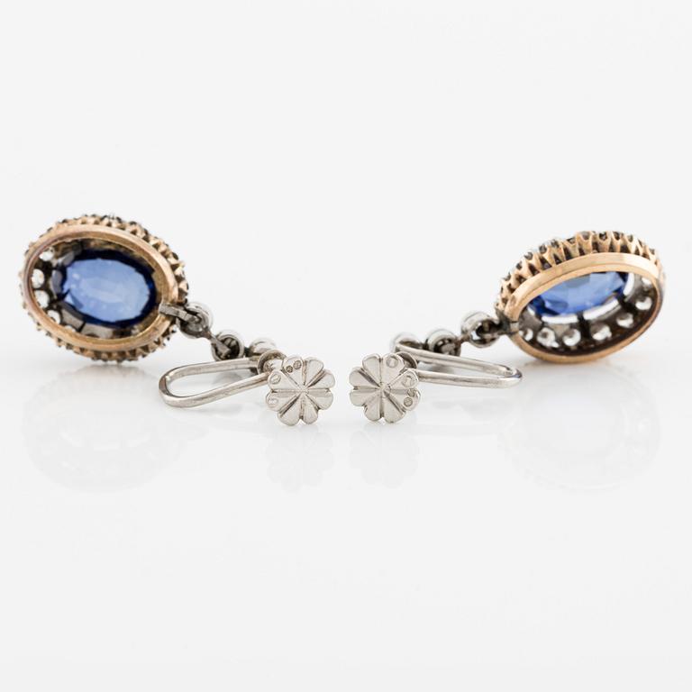 Earrings with synthetic sapphires and brilliant-cut diamonds.