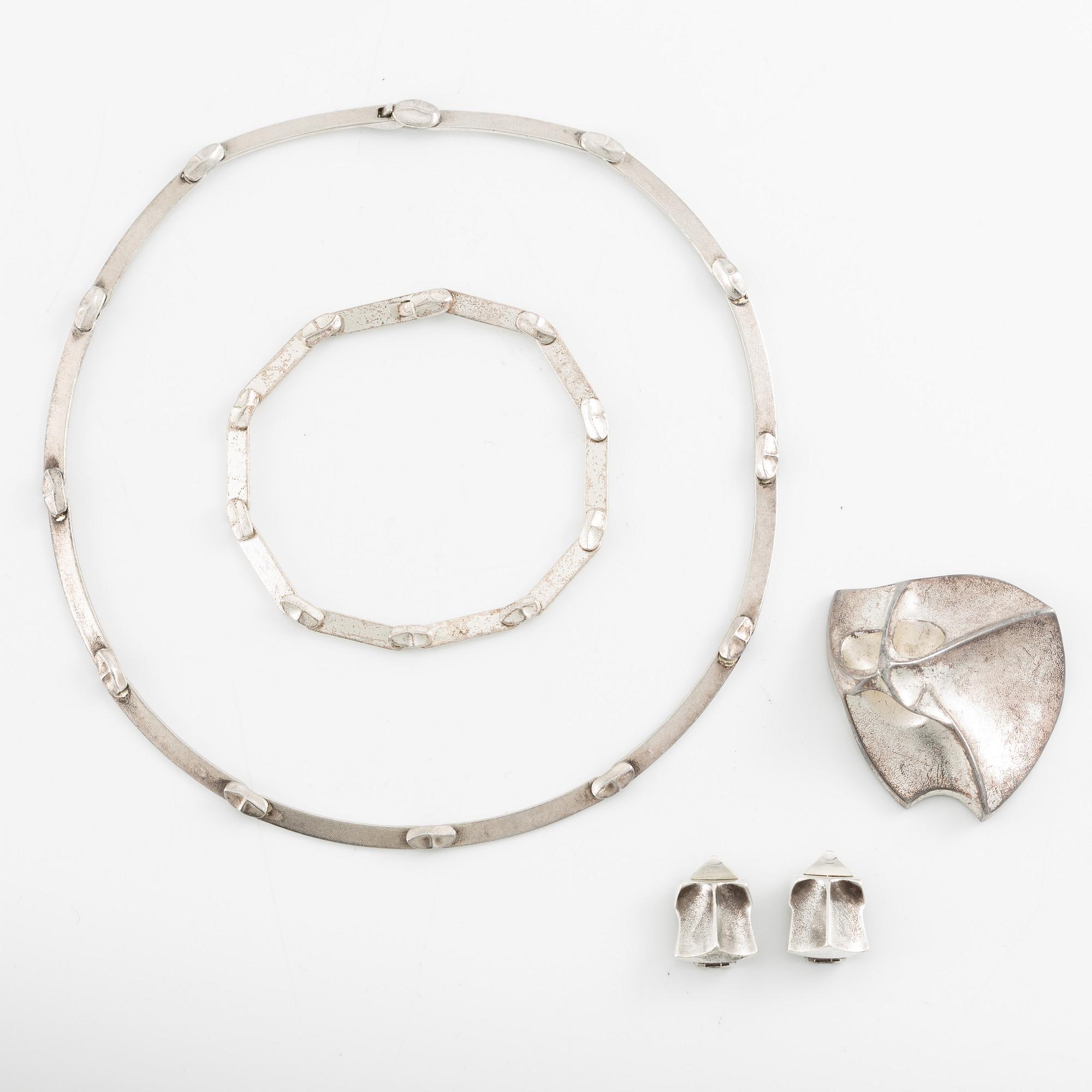 Lapponia a necklace, a pair of earrings and a brooch, sterling silver.
