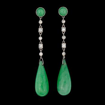 863. A pair of untreated jadeite, and diamond circa 0.30 ct, earrings. Certificate on jade.