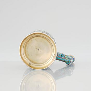 A Russian 19th Century silver-gilt and enamel tea-glass holder, unidentified makers mark, Moscow before 1899.