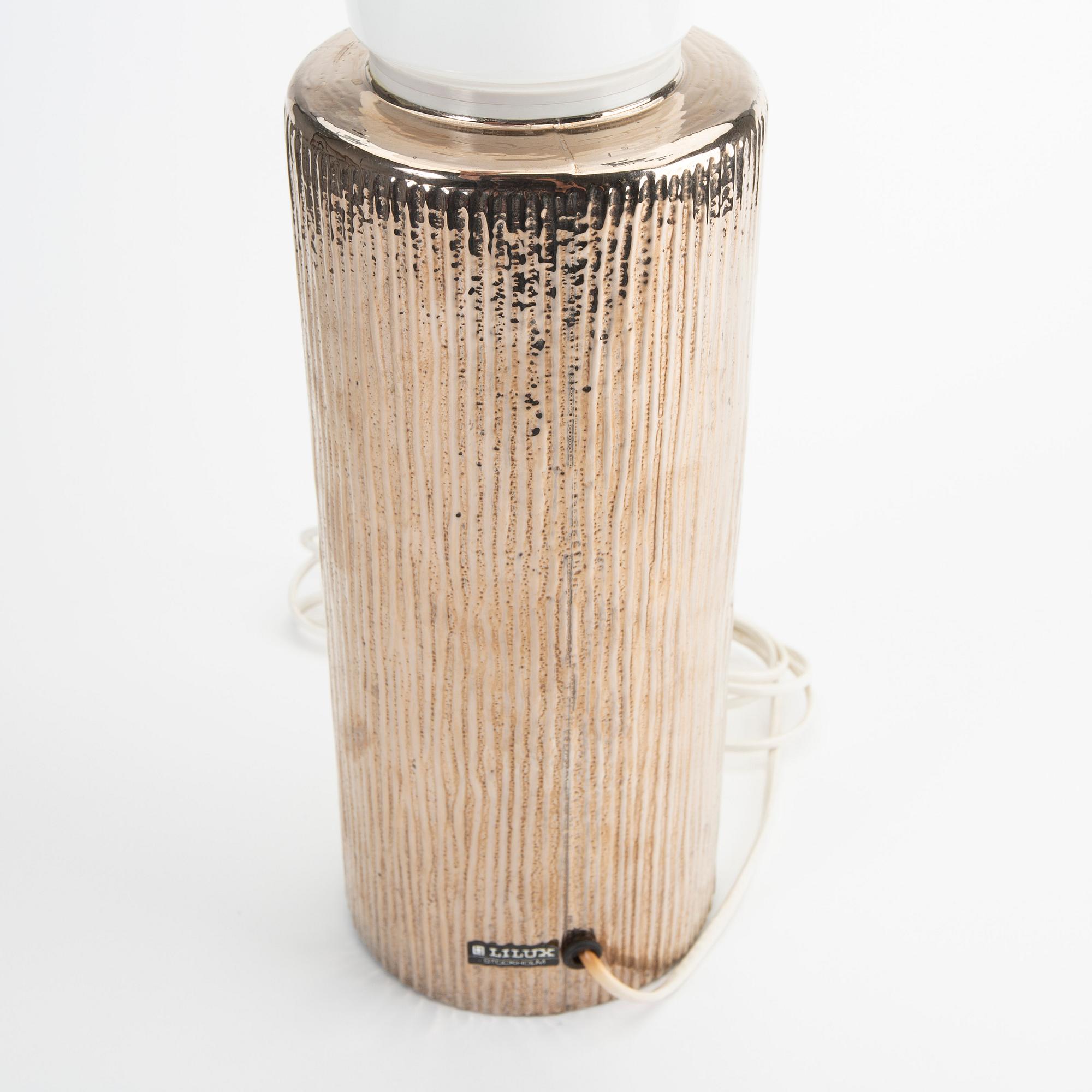 A glass table lamp by Timo Sarpaneva for Linux from the latter half of the 20th century.