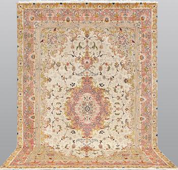 A carpet, Tabriz, part silk, so-called 50 raj, c. 352 x 243 cm.