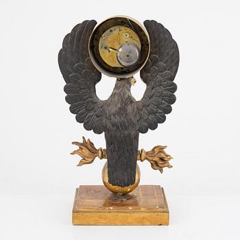 A Swedish Empire giltwood mantel clock by E. Engelbrechten (watchmaker active in Stockholm 1815-45).