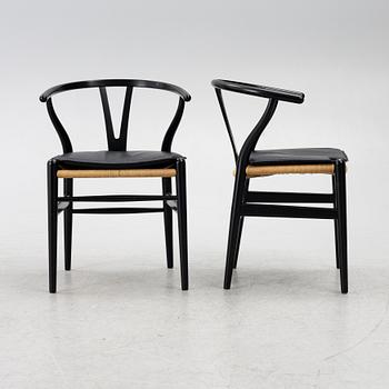 Hans J. Wegner, four CH24/ "Wishbone" chairs, Carl Hansen & Son, Denmark, 21st century.