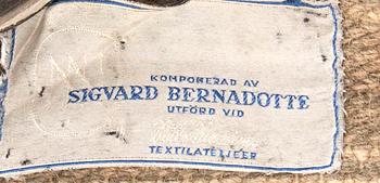 Sigvard Bernadotte, a knoted pile in relief carpet marked N Nessim with label 193x122 cm.