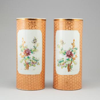 A pair of Chinese famille rose hat stands, 20th century.