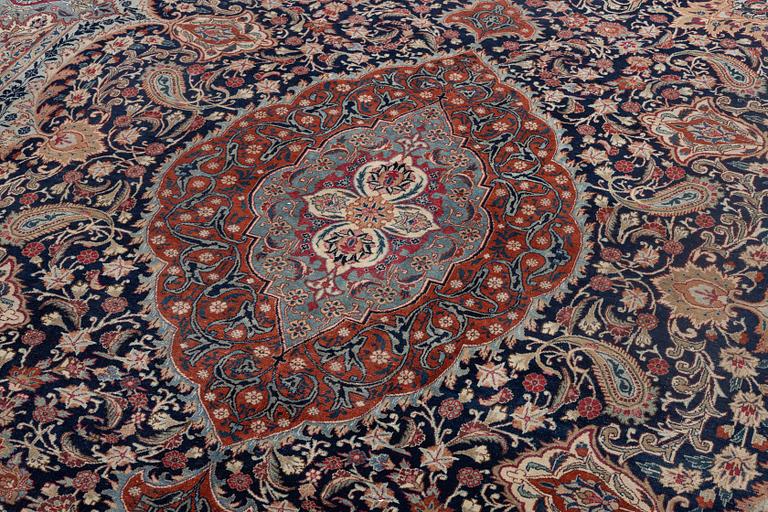 A Kashmar carpet, c. 390 x 289 cm.