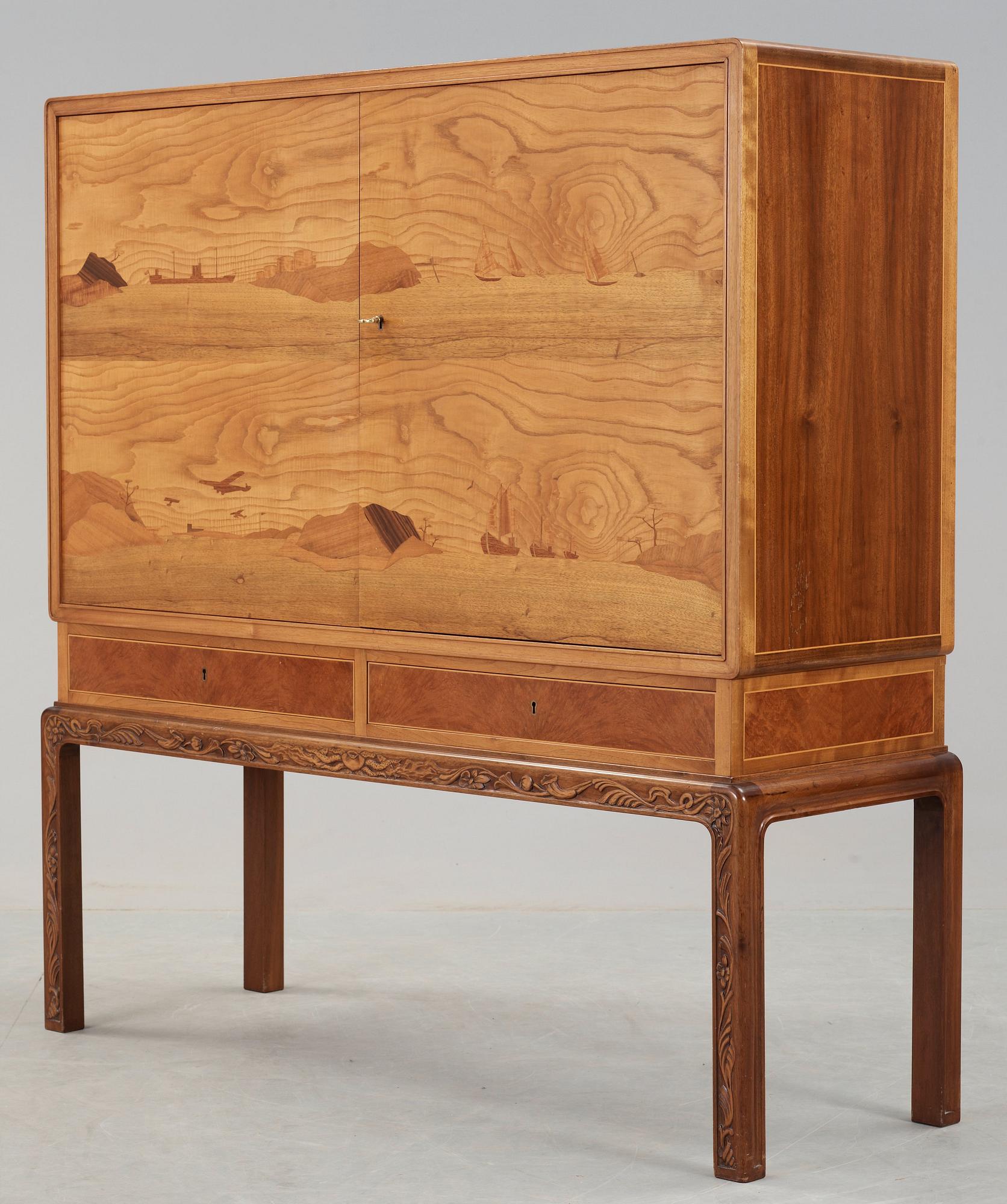 A Georg Johansson cabinet with inlays of several exotic woods, Gothenburg Sweden 1938.