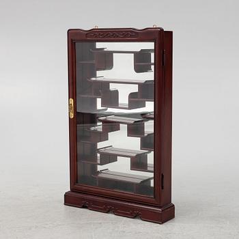 A wall hanged display cabinet, China, 20th century.