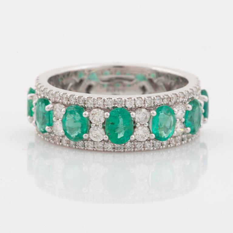 Emerald and brilliant cut diamond ring.