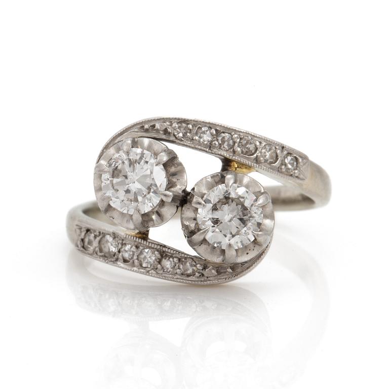 A cross-over ring set with old and eight-cut diamonds.