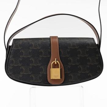 Céline, Bag "Tabou Clutch on Strap".