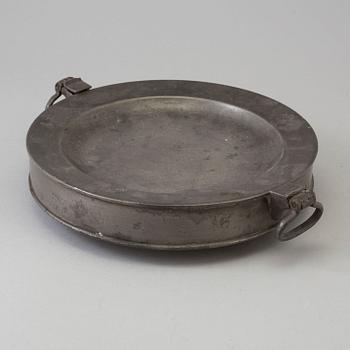 A 19th century pewter plate.