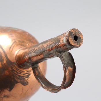 A 19th century pipette in copper.