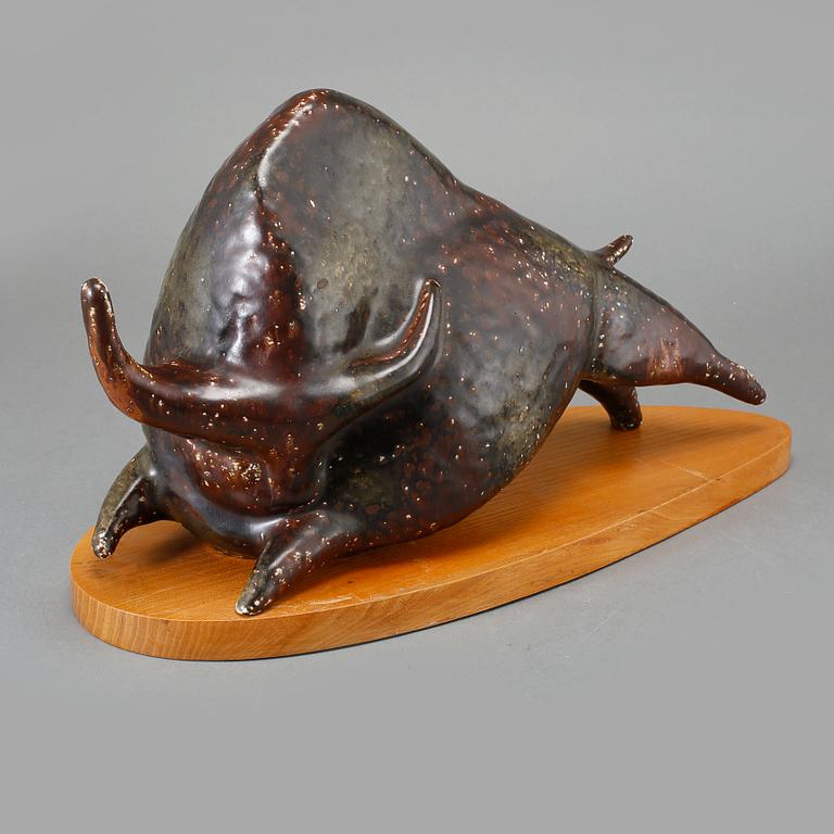 FIGURIN, stengods, signerad LM, 1900-talets andra hälft.