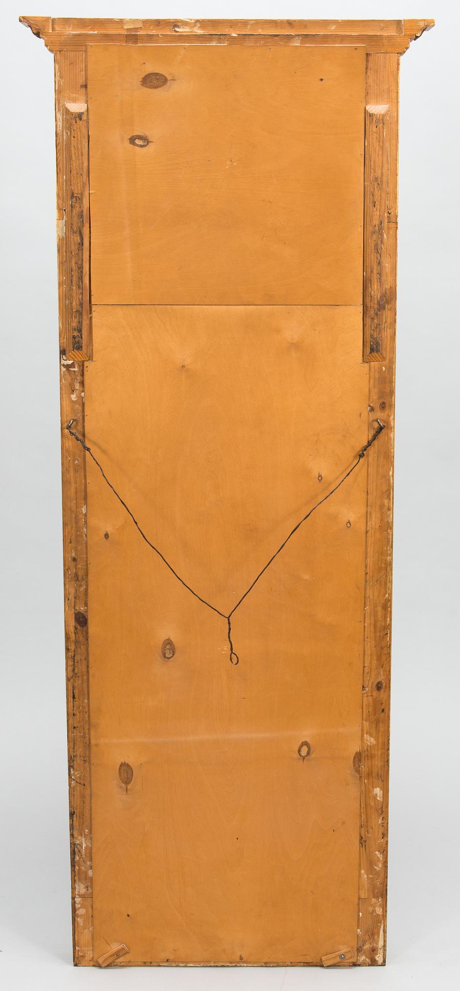 An early 20th century mirror with console table in late Gustavian style.