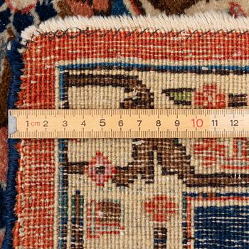 Semi-antique Tabriz rug, approx. 365 x 275 cm.