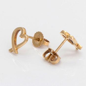 Tiffany & Co, Paloma Picasso, a pair of 18K yellow gold 'Loving Heart' earrings,