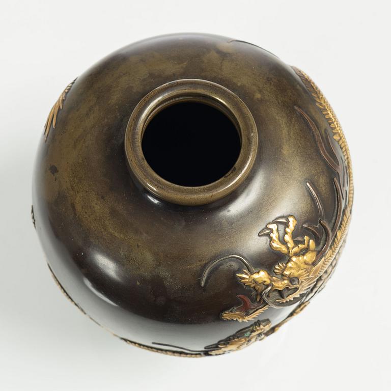 A Japanese gilt bronze and silvered dragon vase, Meiji period (1868-1912). Signed.