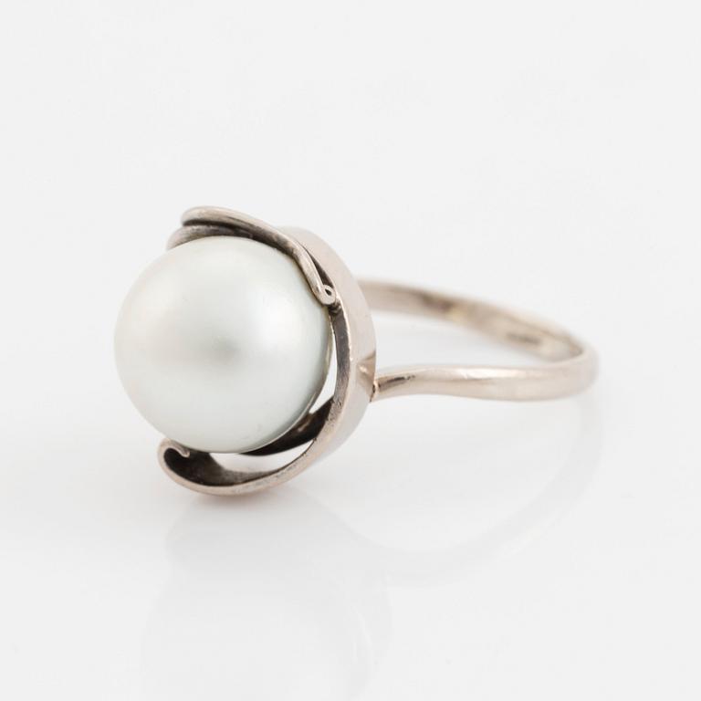 Ring 14K guld med en pärla.