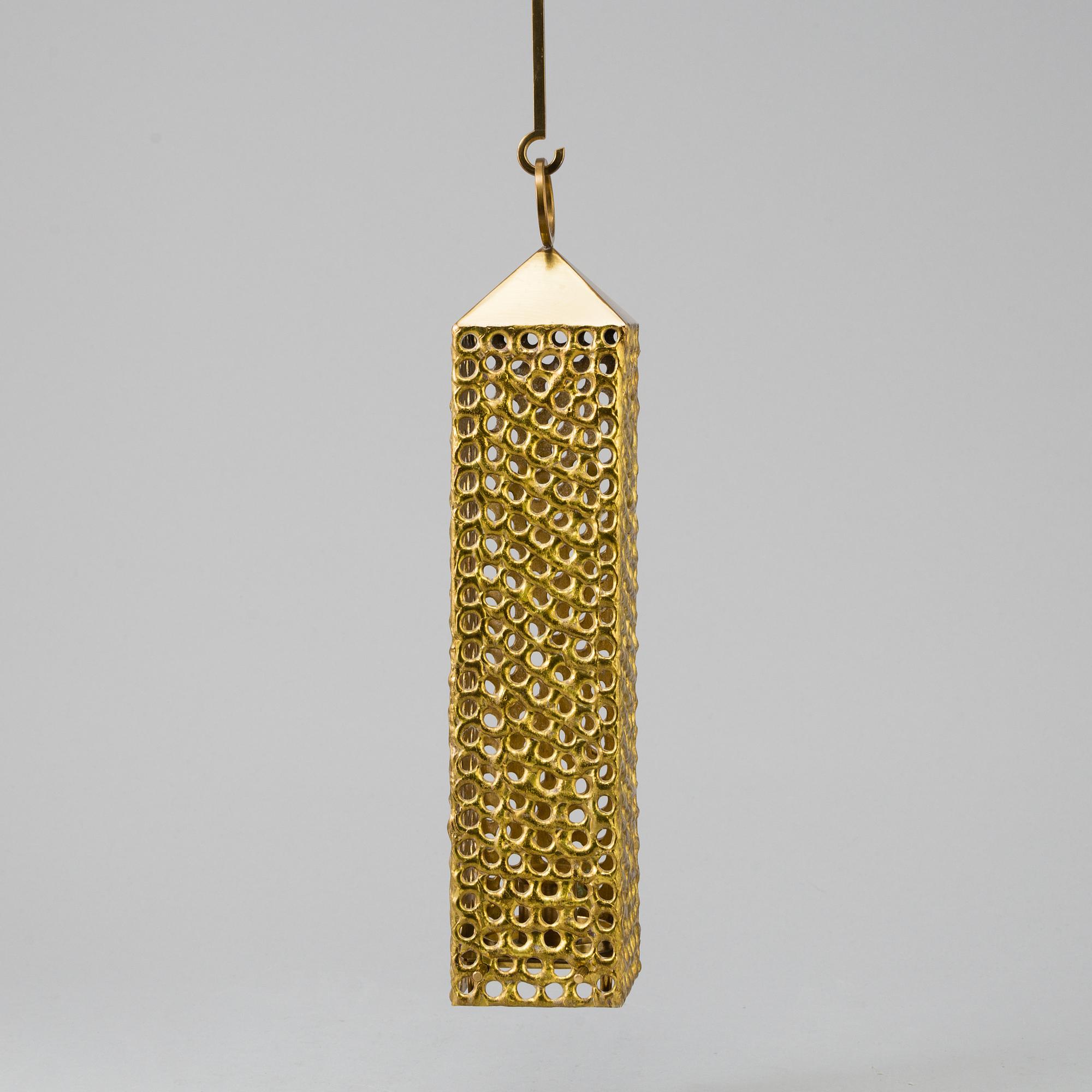 a brass ceiling light by Pierre Forsell for Skultuna.