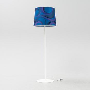 A white metal floor light, Luxus, Vittsjö.