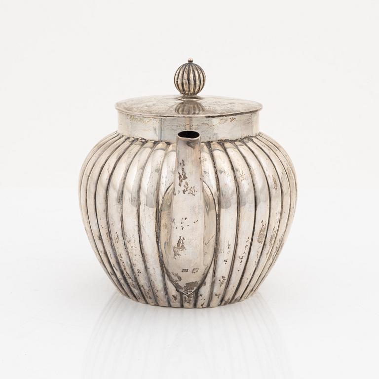 A silver teapot, bearing the mark of K. Andersson, Stcokholm, 1905.