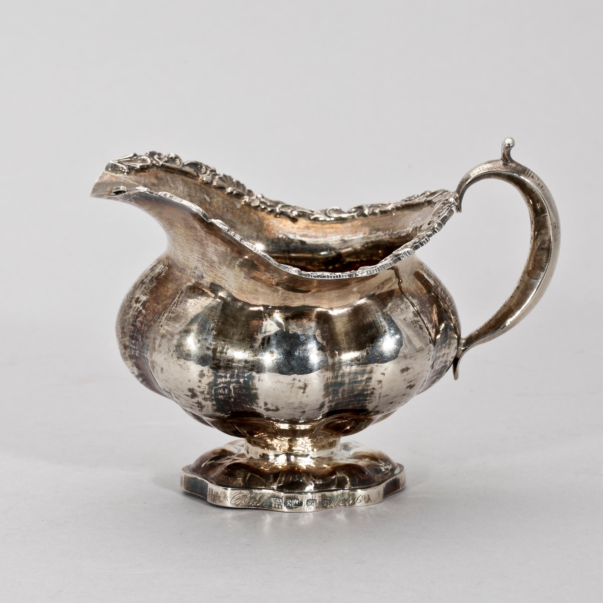 GRÄDDKANNA, silver, nyrokoko, St Petersburg 1856. Vikt ca 140 gram.