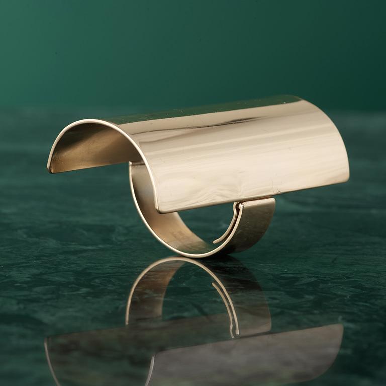 A bracelet by MARTIN MARGIELA.