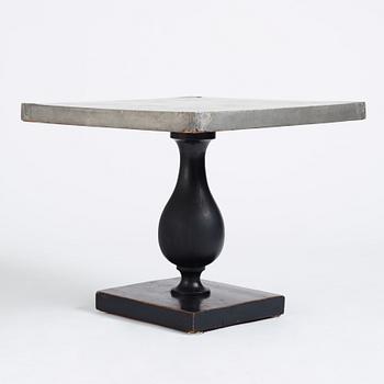 Uno Åhrén, a black lacquered table with a pewter top by Nils Fougstedt, Svenskt Tenn ca 1930. Alva & Gunnar Myrdal Collection.