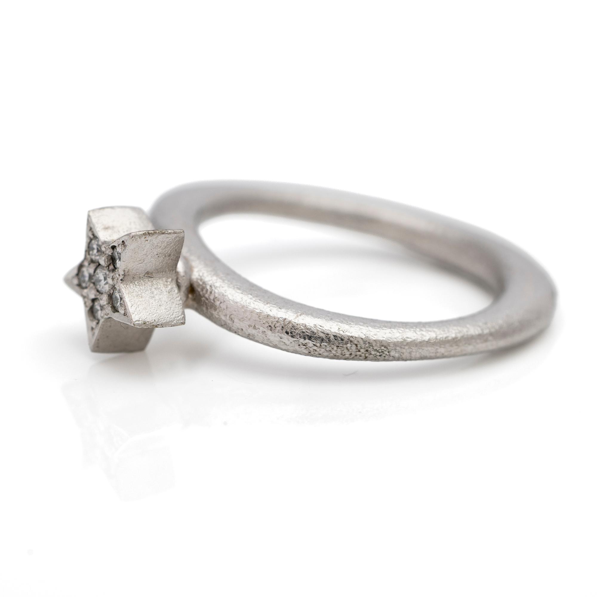 Ole Lynggaard, Ring, “Love”, 18K white gold with brilliant-cut diamonds, designed by Charlotte Lynggaard.