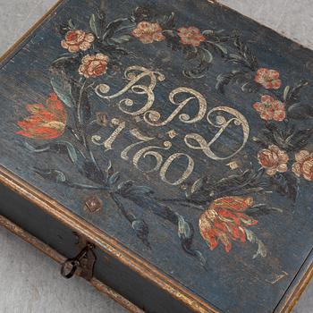 A painted wooden box, marked 1760.