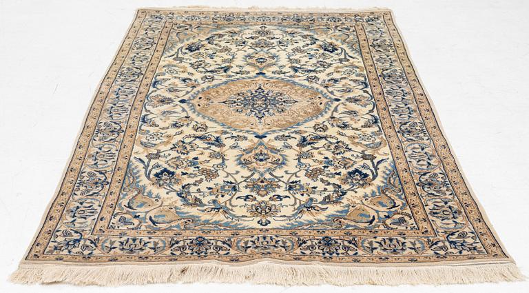 A Nain rug, part silk, figural, c. 196 x 118 cm.