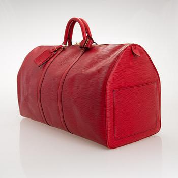 A RED EPI LEATHER KEEPALL TRAVEL BAG.