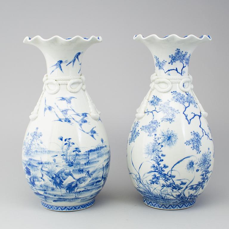 A matched pair of blue and white vases, Japan, early 20th Century.